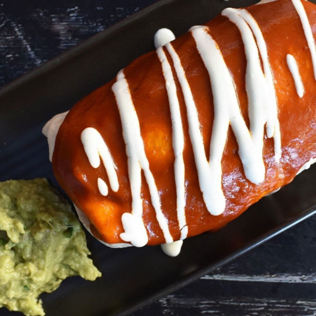 Have you tried our DELUXE BURRITO? Topped with salsa, sour cream, and guacamole! 🌯🥑#BurritoBar #ModernMexican #Burritos #BurritoLovers #Guacamole
